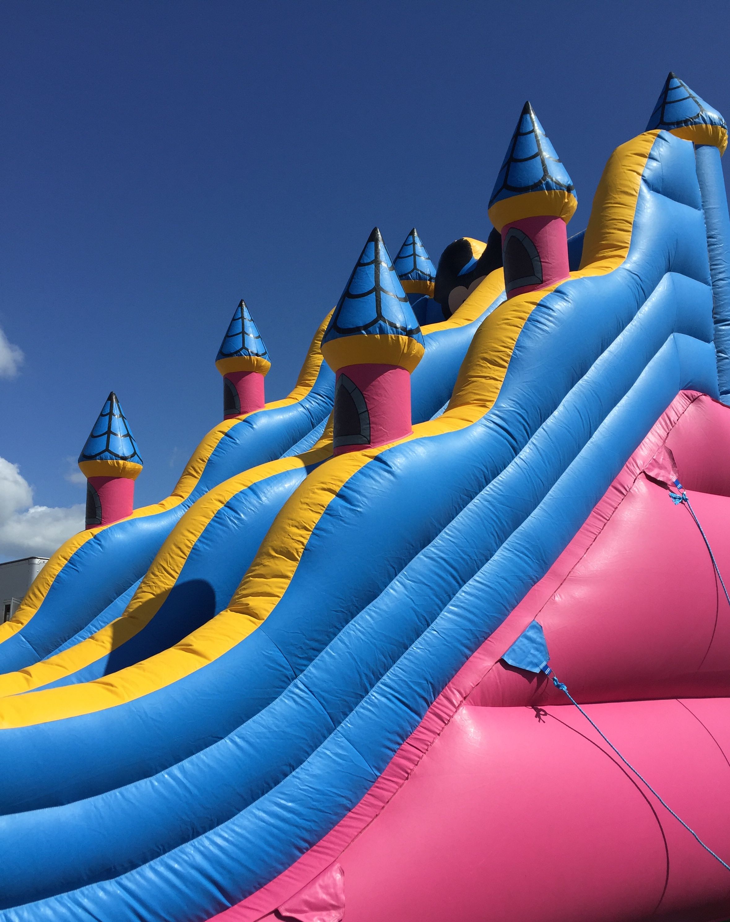 Colourful jumping castle for hire