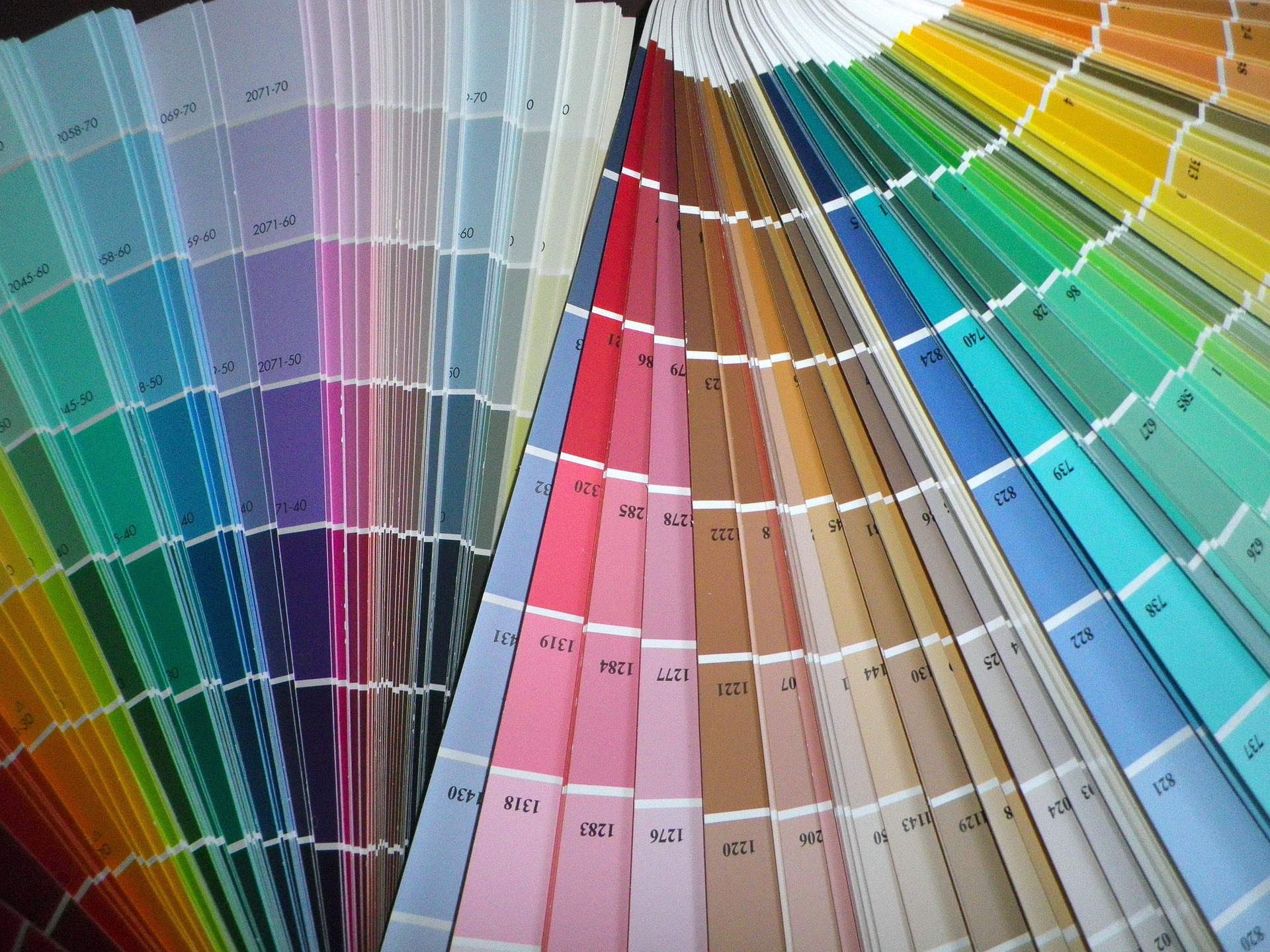 Paint colour swatches and brush for choosing wall colours