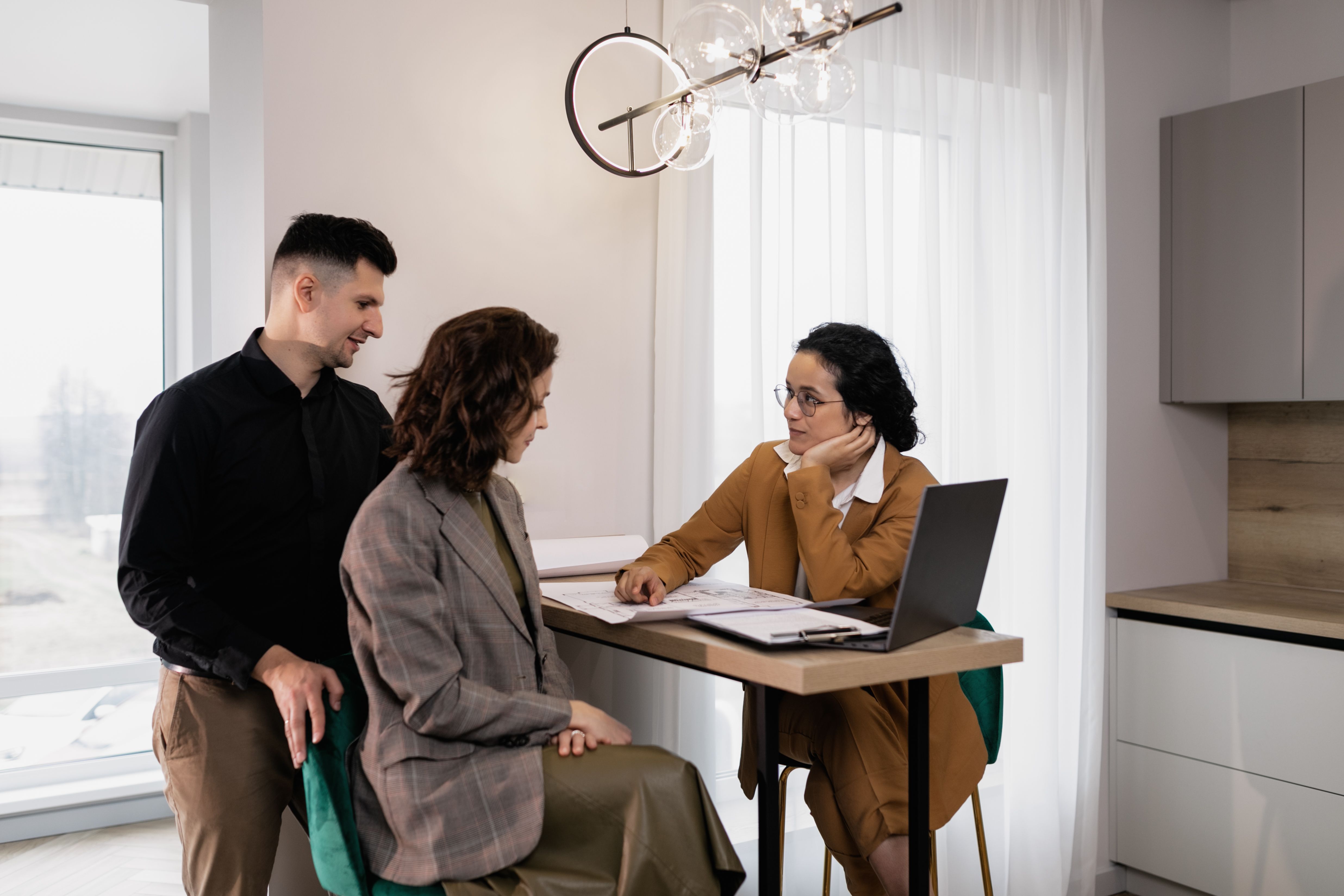 Event planner reviewing details with a client