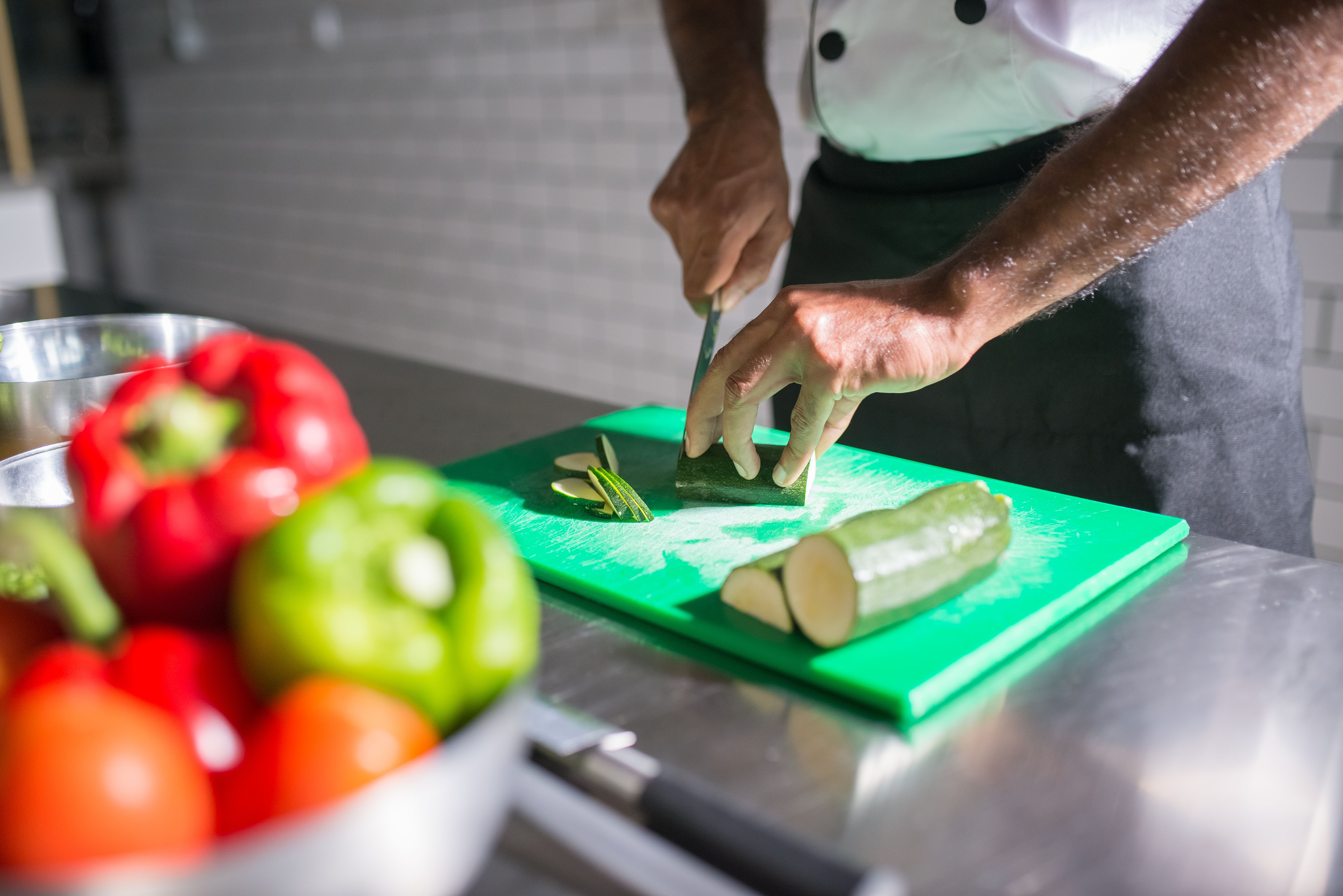 Fresh vegetables being prepared in a restaurant kitchen