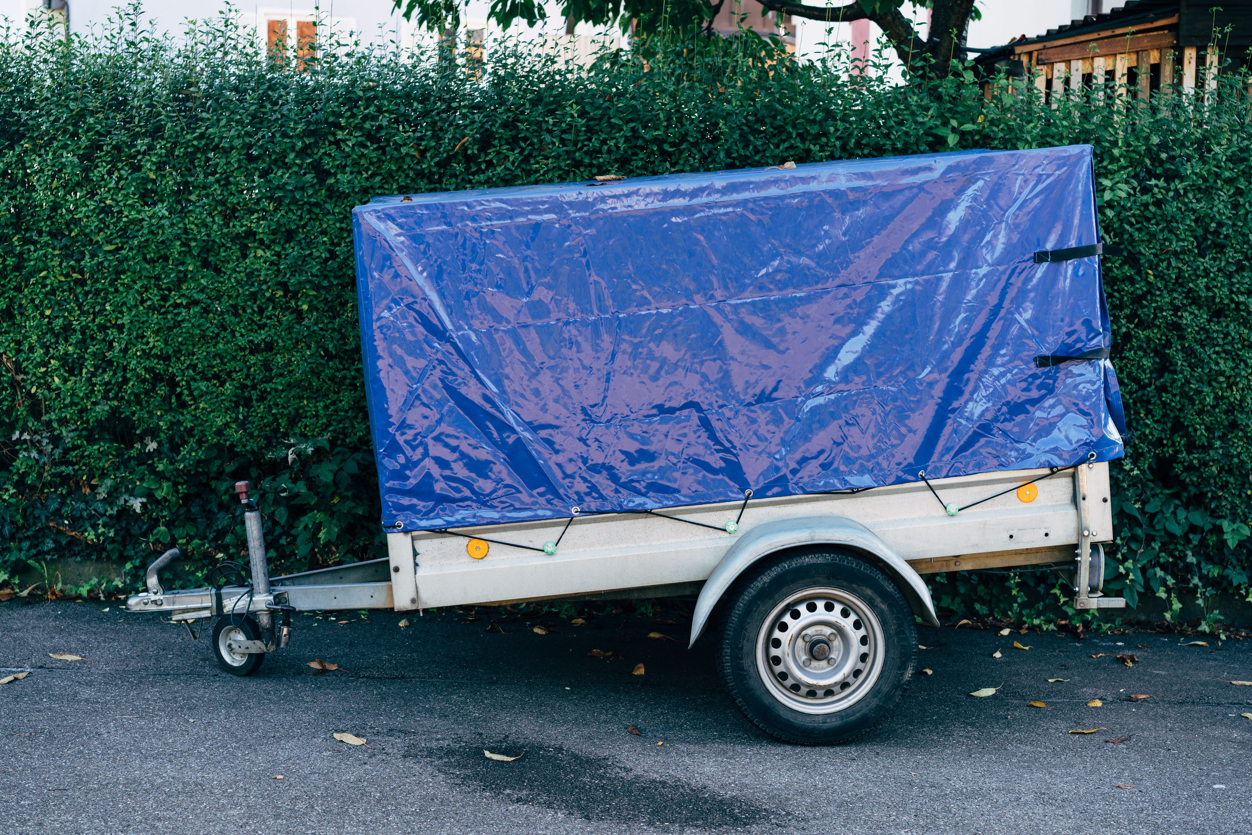 Covered trailer for furniture and weather protection