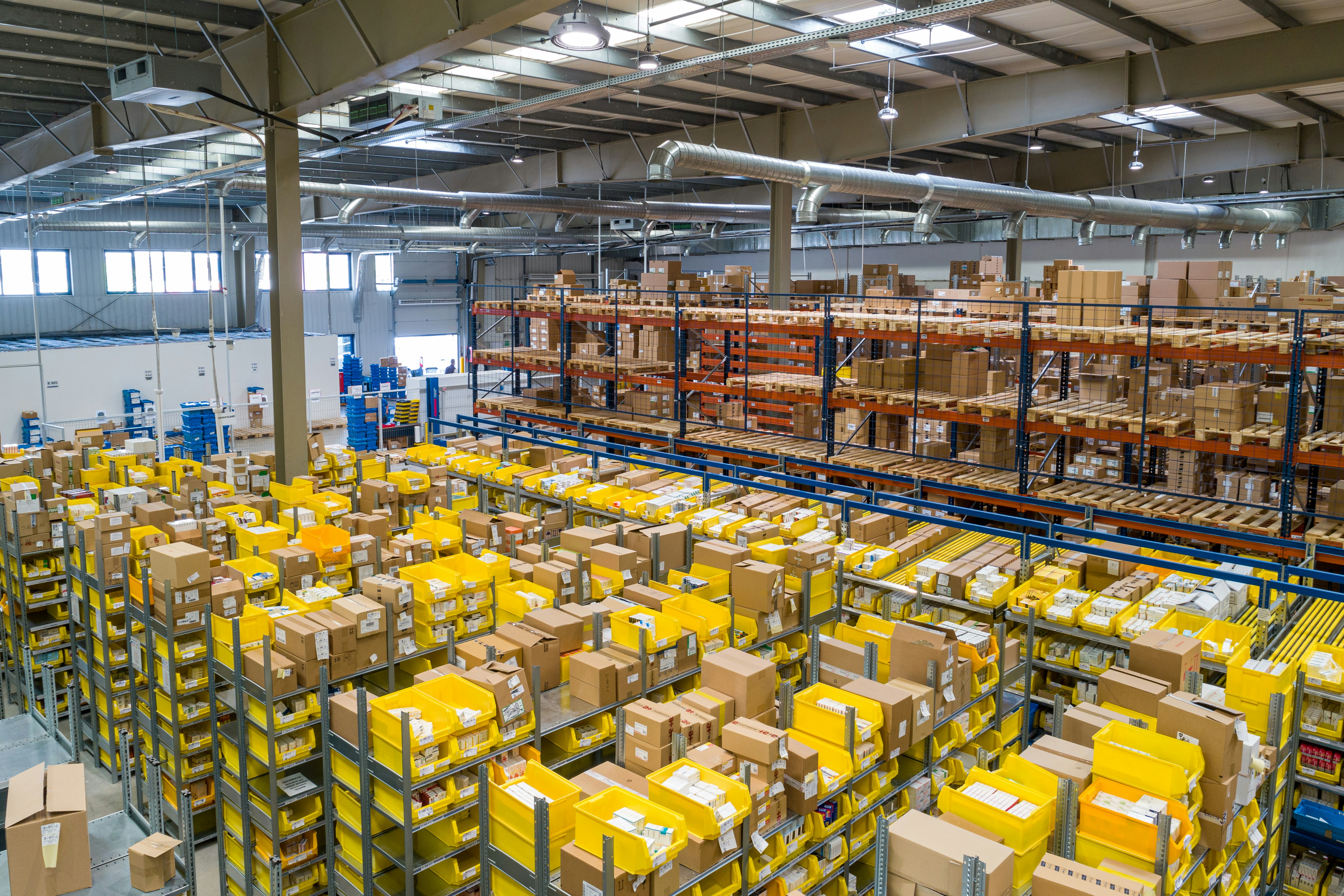 Cardboard boxes stacked in a warehouse storage area