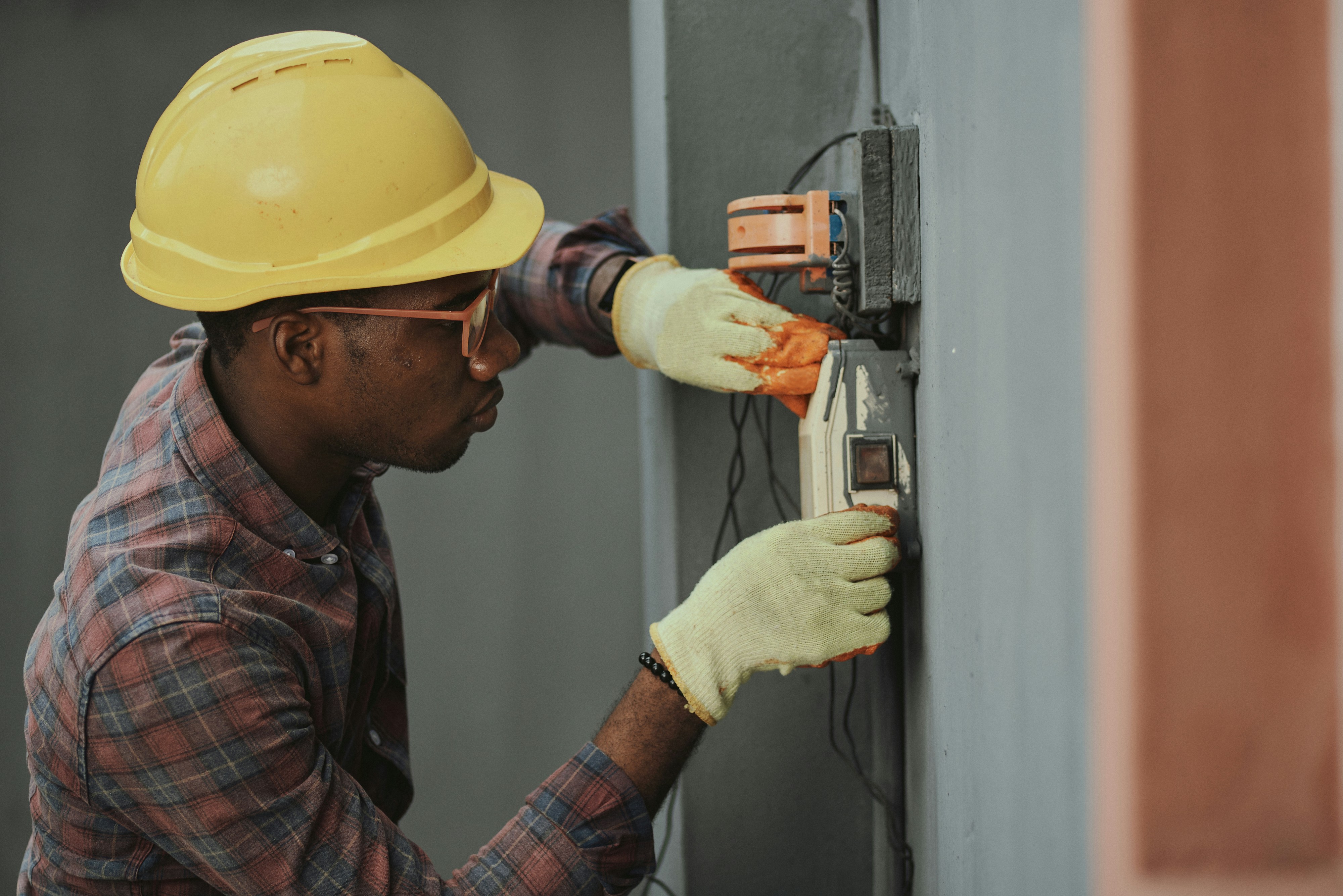 Technician checking backup power equipment