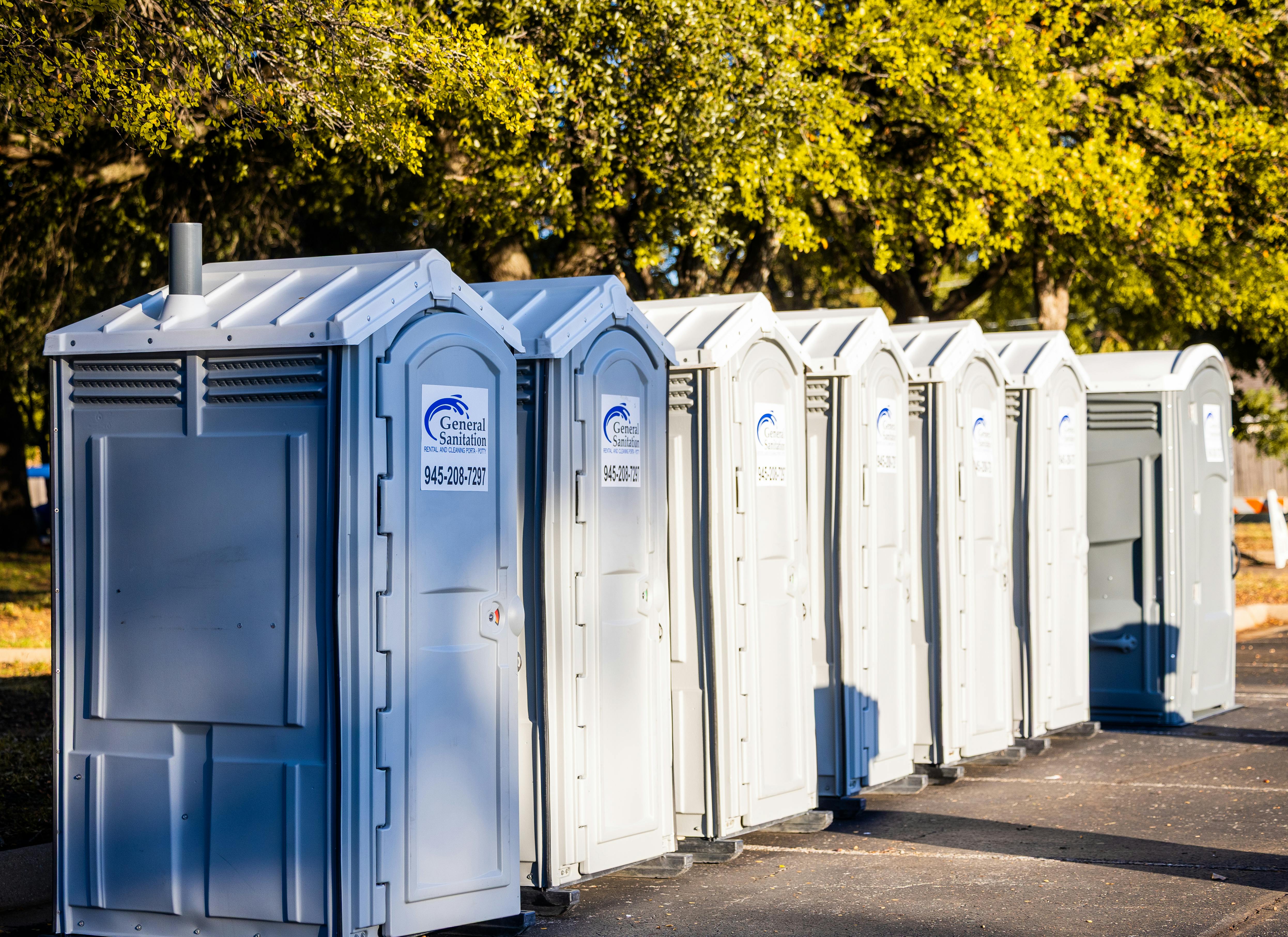 Portable toilets ready for outdoor hire