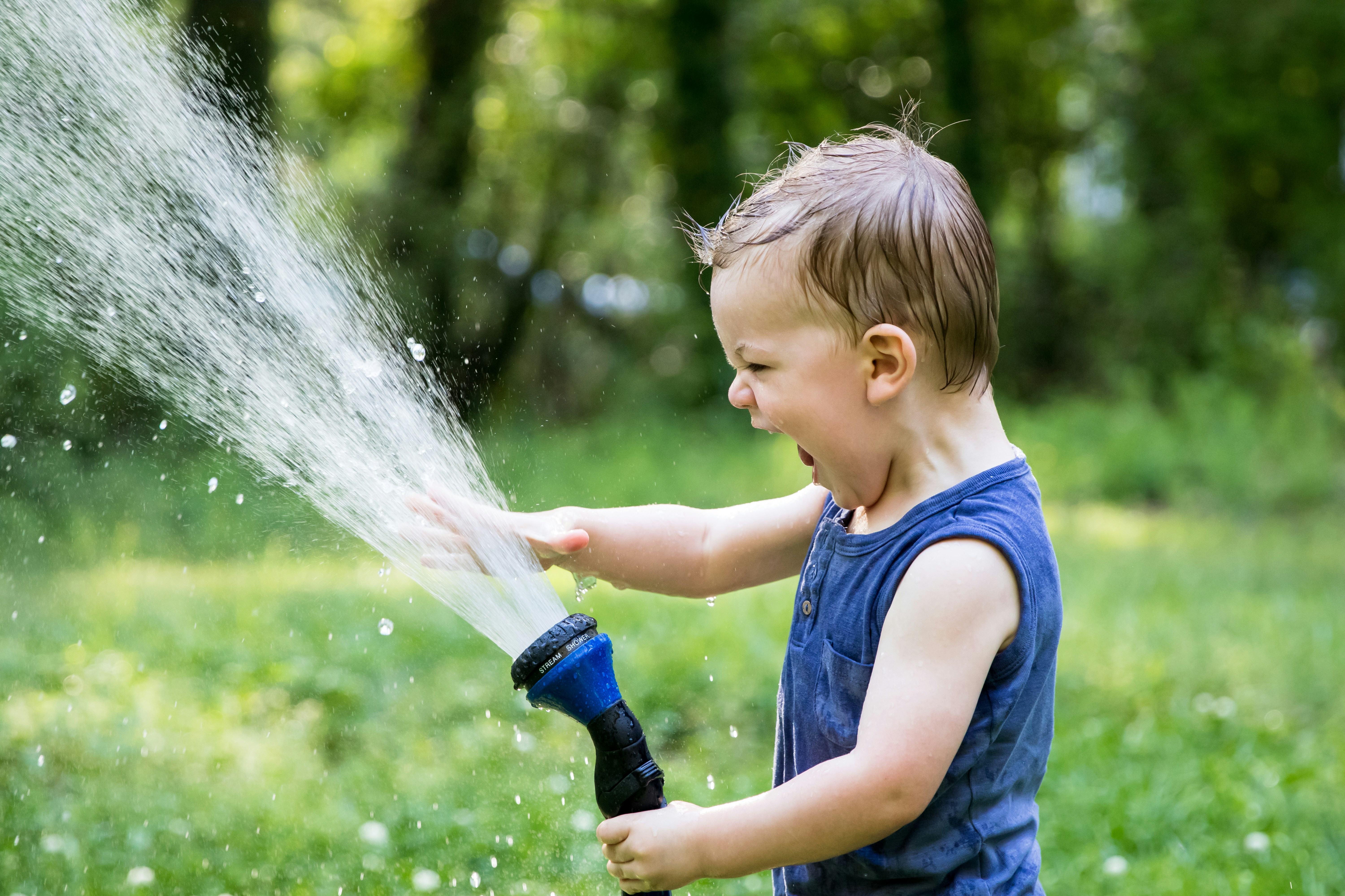 Irrigation worker helping with a garden water system