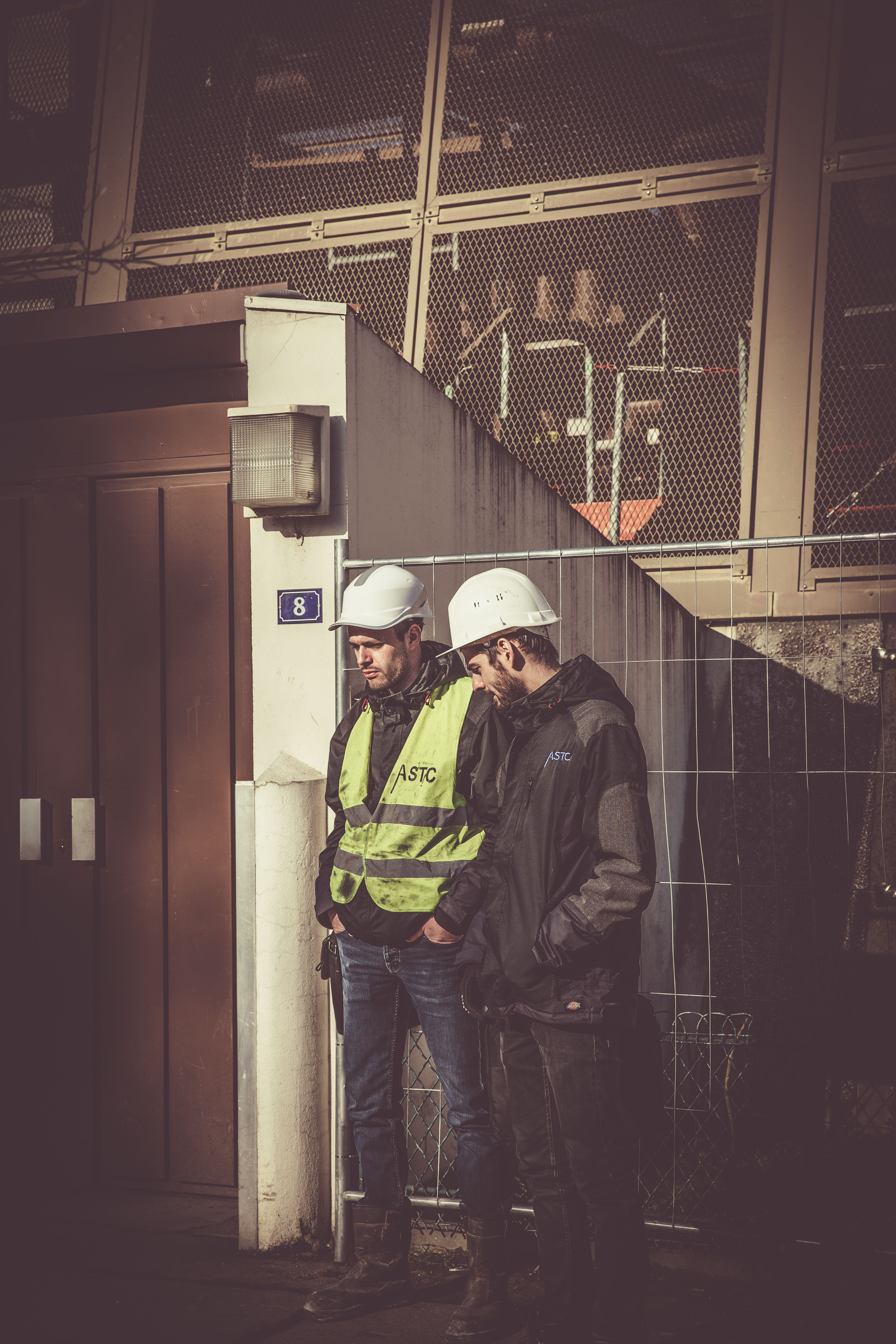 Workers wearing branded workwear