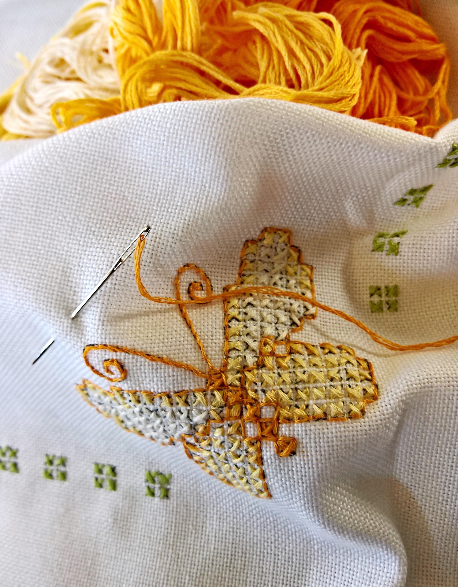 Close-up detail of embroidered branding on clothing
